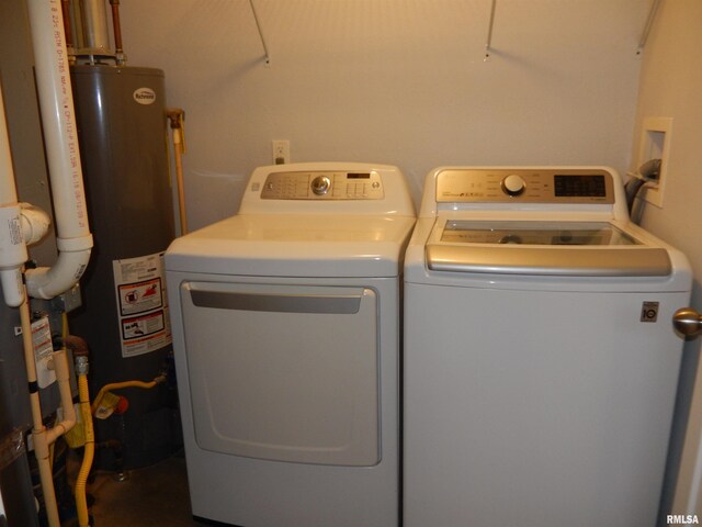 laundry area featuring washer and clothes dryer and gas water heater