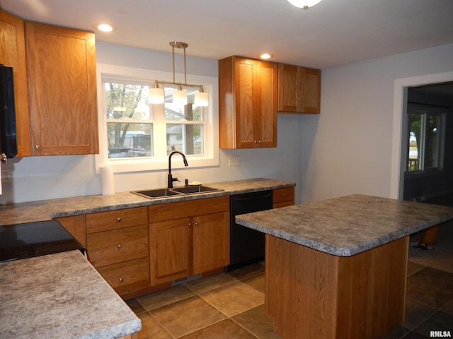 kitchen featuring a center island, brown cabinets, dishwasher, and a sink