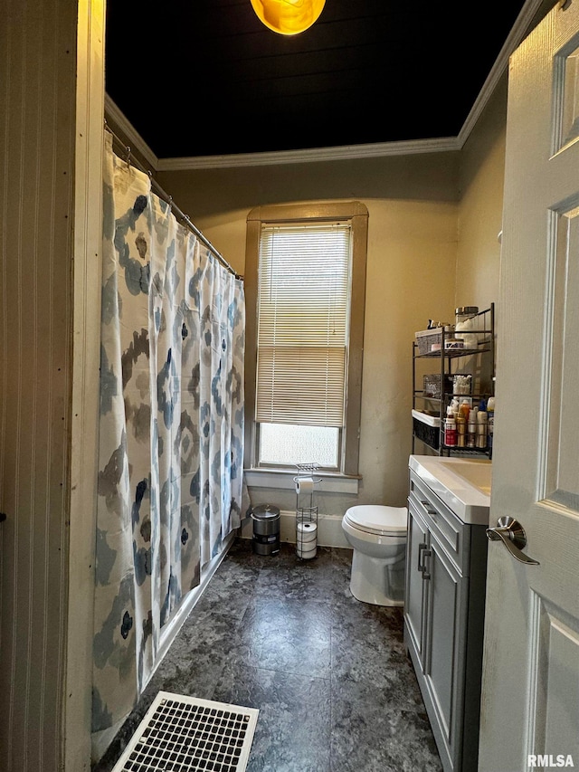 bathroom with vanity, toilet, crown molding, and a shower with curtain