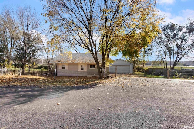 view of front of house with an outbuilding and a garage