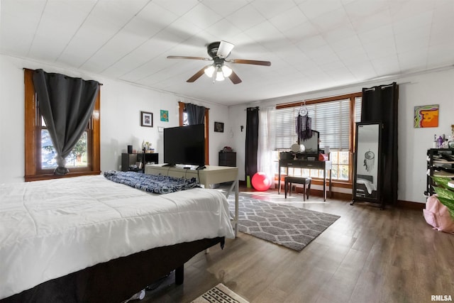 bedroom with hardwood / wood-style flooring