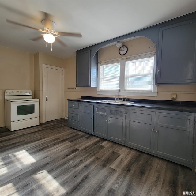 kitchen featuring gray cabinetry, sink, electric range, and dark hardwood / wood-style flooring