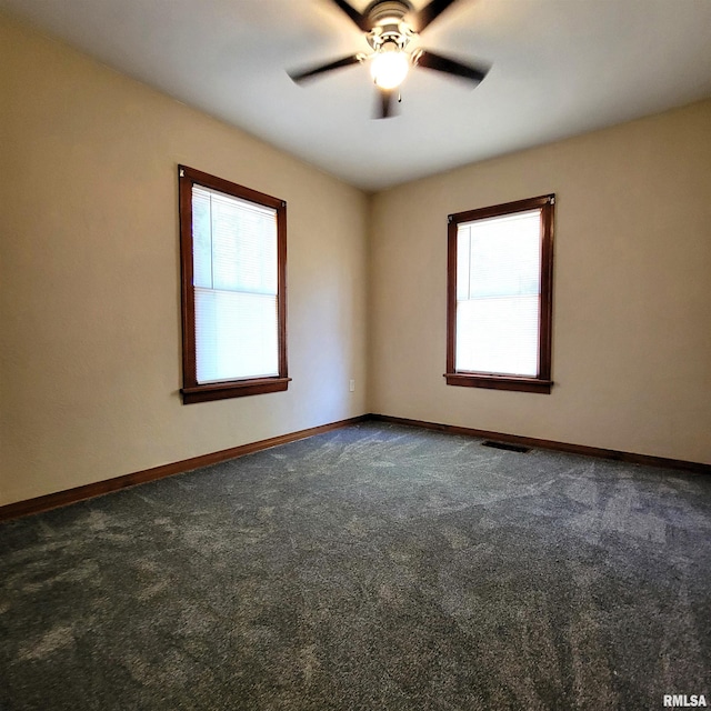 unfurnished room featuring carpet and ceiling fan