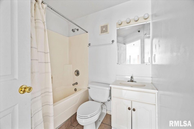 123 SW Jefferson Ave Unit E3S, Peoria, IL 61602 - full bathroom featuring toilet, vanity, shower / bath combination with curtain, and tile patterned floors