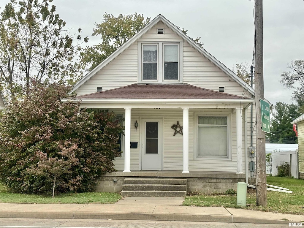 619 S Main St, Lewistown, IL 61542 - view of front of house featuring covered porch and a shingled roof