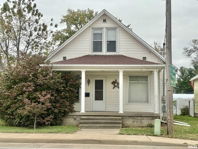 619 S Main St, Lewistown, IL 61542 - view of front of house featuring covered porch and a shingled roof