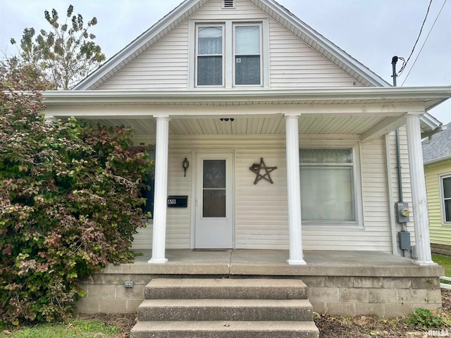 property entrance featuring covered porch