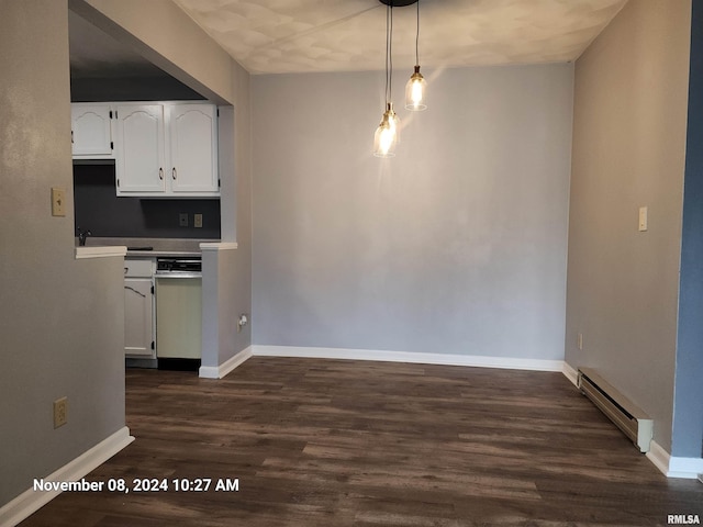 kitchen with white cabinets, baseboard heating, pendant lighting, and dark hardwood / wood-style flooring