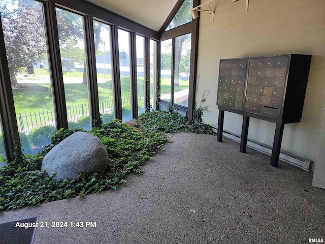 sunroom / solarium with lofted ceiling