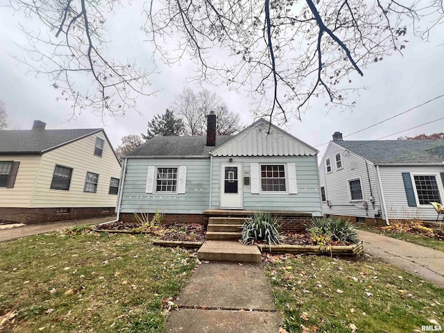 view of front of home with a front yard