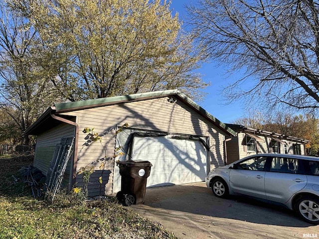 300 W Bobbi Ln, Vermont, IL 61484 - view of property exterior with a garage and concrete driveway