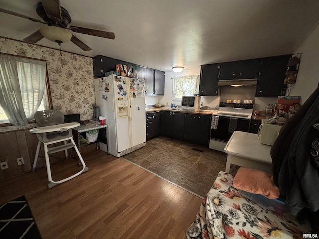 300 W Bobbi Ln, Vermont, IL 61484 - kitchen with white appliances, a ceiling fan, dark cabinets, under cabinet range hood, and dark wood finished floors