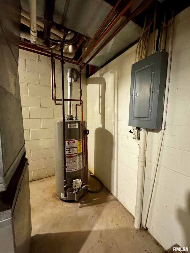 utility room with electric panel and gas water heater