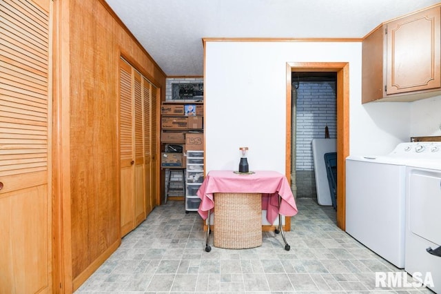 dining space with washing machine and clothes dryer