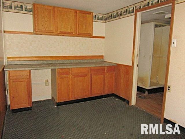 410 W Illinois St, Spring Bay, IL 61611 - kitchen featuring brown cabinetry