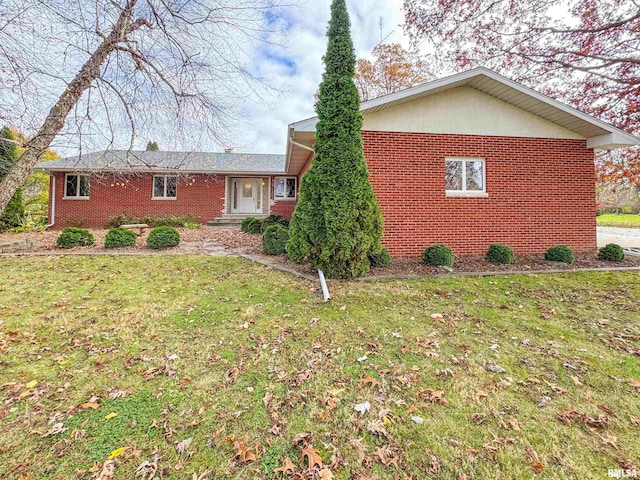 exterior space with a front yard