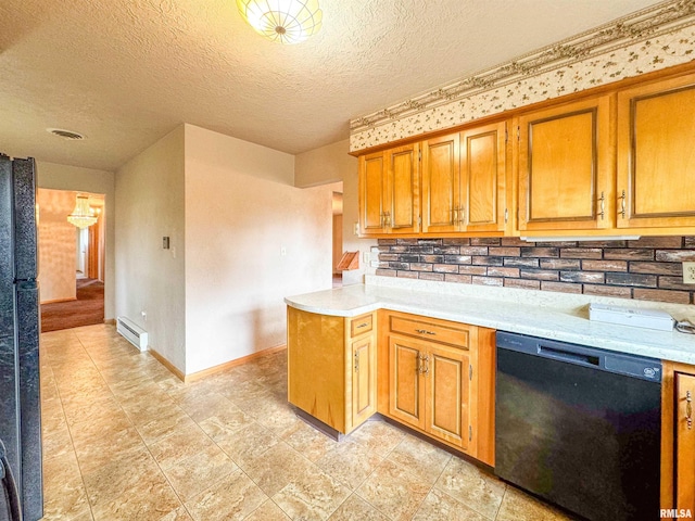 kitchen with tasteful backsplash, a textured ceiling, black dishwasher, kitchen peninsula, and baseboard heating