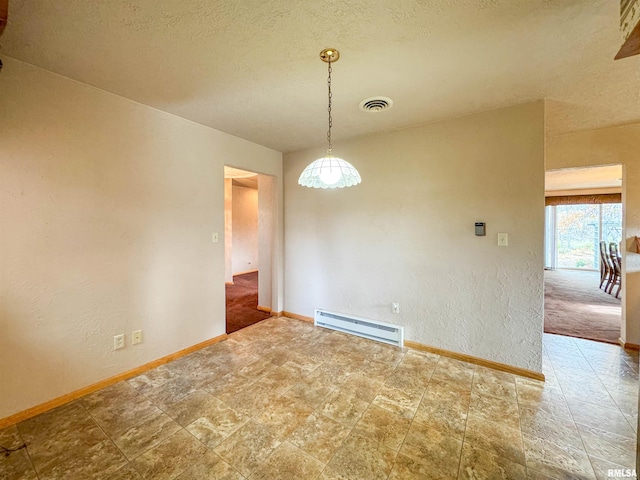 unfurnished room featuring a textured ceiling and a baseboard radiator