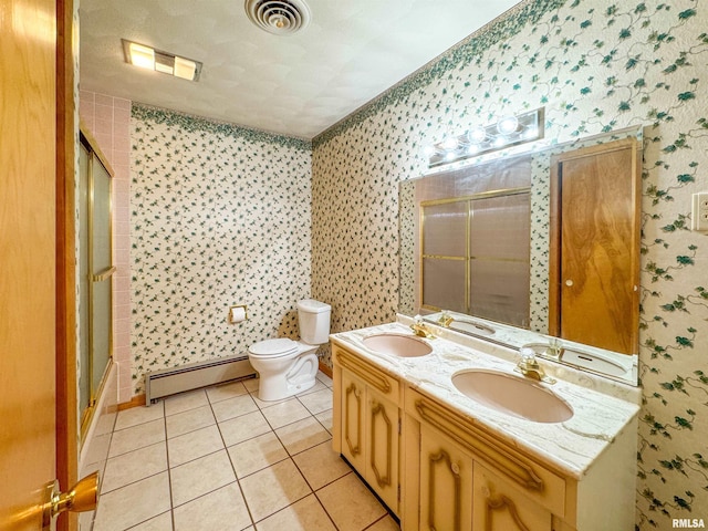 full bathroom featuring a baseboard heating unit, enclosed tub / shower combo, toilet, tile patterned floors, and vanity