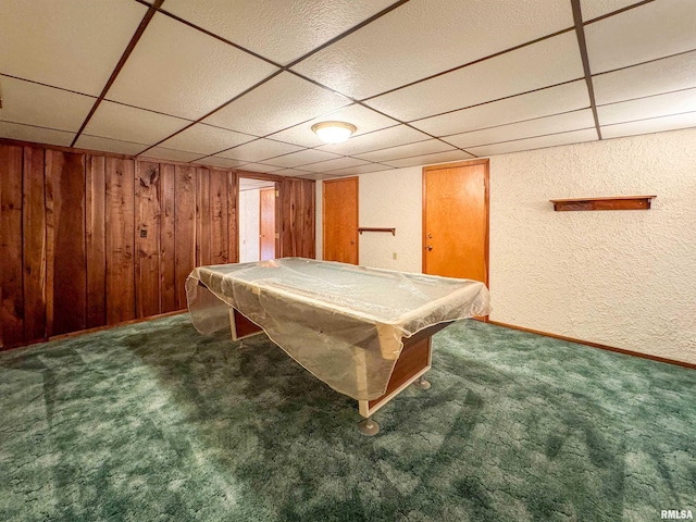 game room featuring pool table, dark carpet, and a drop ceiling