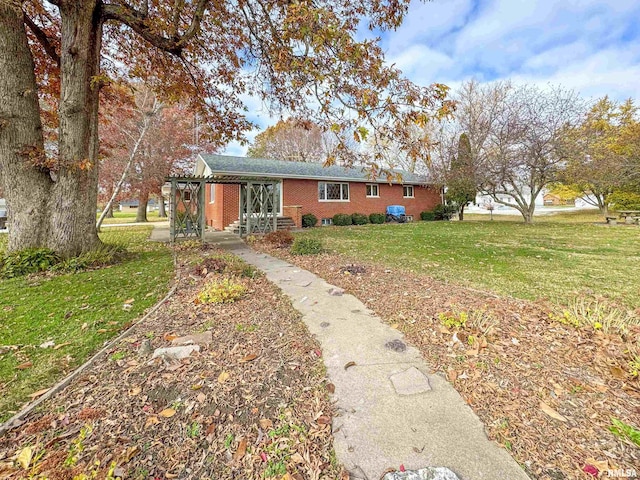 ranch-style home with a front yard