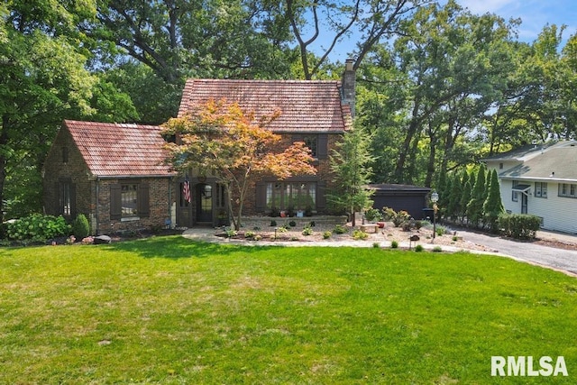 view of front of home with a front yard