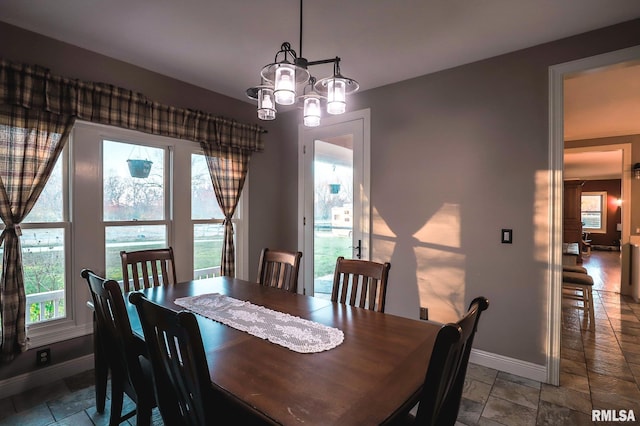 dining room with a chandelier