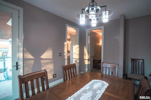 dining room featuring a chandelier