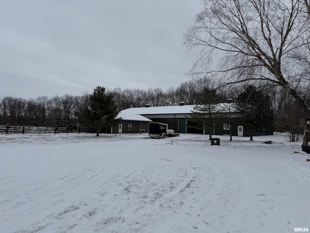 view of yard covered in snow