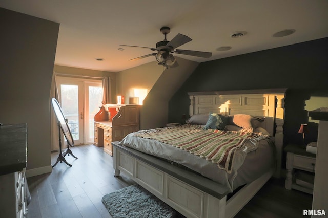 bedroom with ceiling fan, light hardwood / wood-style floors, and vaulted ceiling