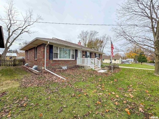 single story home featuring a front yard