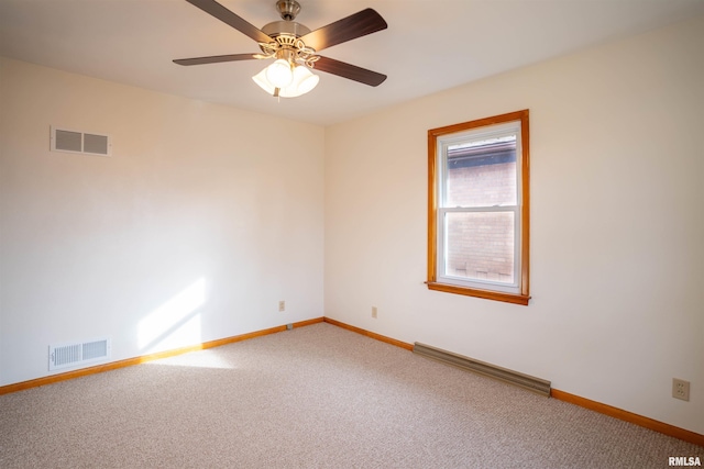 carpeted empty room with ceiling fan