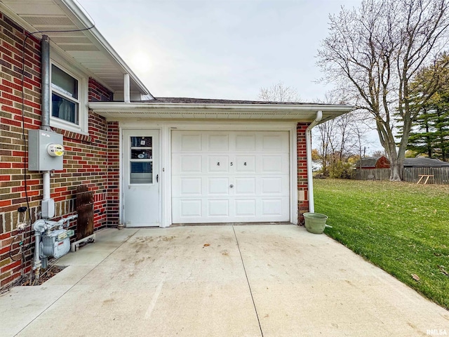 garage with a yard