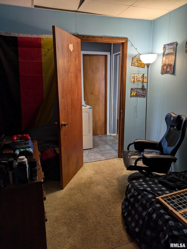 carpeted bedroom with washer / clothes dryer