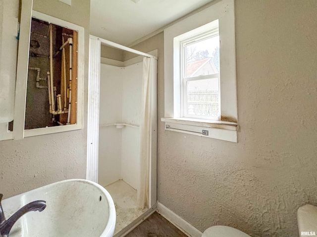 bathroom with a shower