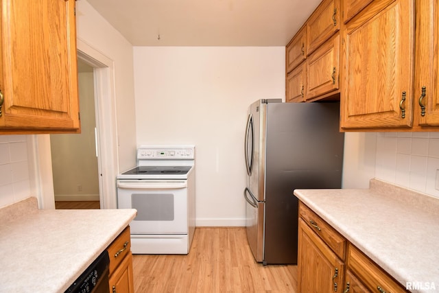 kitchen featuring decorative backsplash, stainless steel fridge, light wood-type flooring, white electric stove, and dishwasher