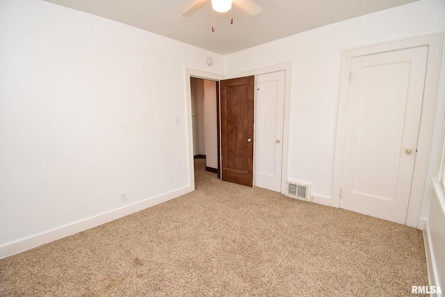 unfurnished bedroom with carpet and ceiling fan