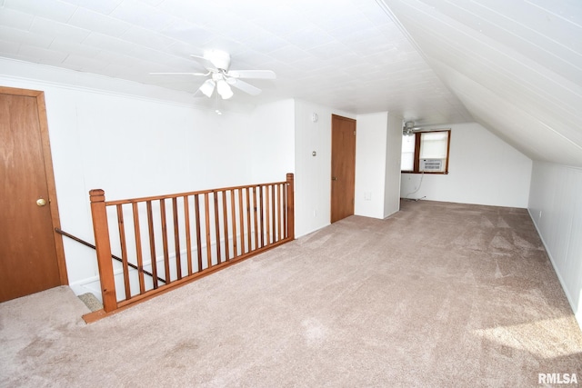 additional living space with light carpet, lofted ceiling, ceiling fan, and cooling unit