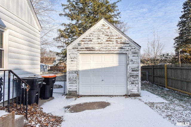 view of snow covered garage