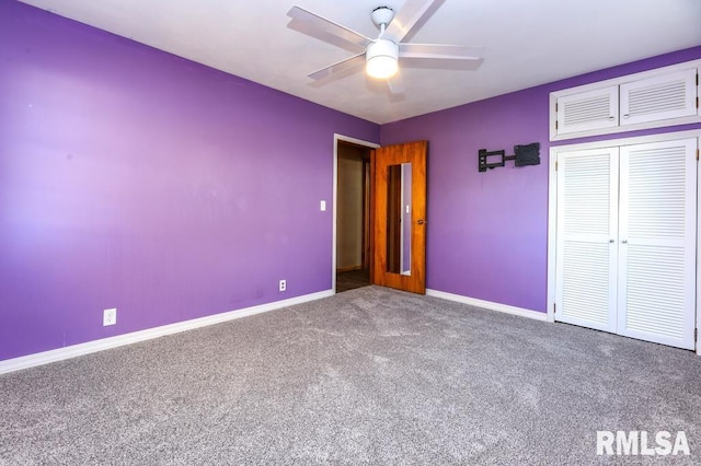 unfurnished bedroom with ceiling fan, a closet, and carpet