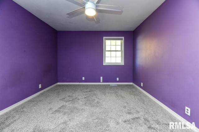 unfurnished room featuring carpet floors and ceiling fan