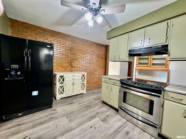 kitchen with stainless steel electric range oven, brick wall, light hardwood / wood-style flooring, and black refrigerator with ice dispenser