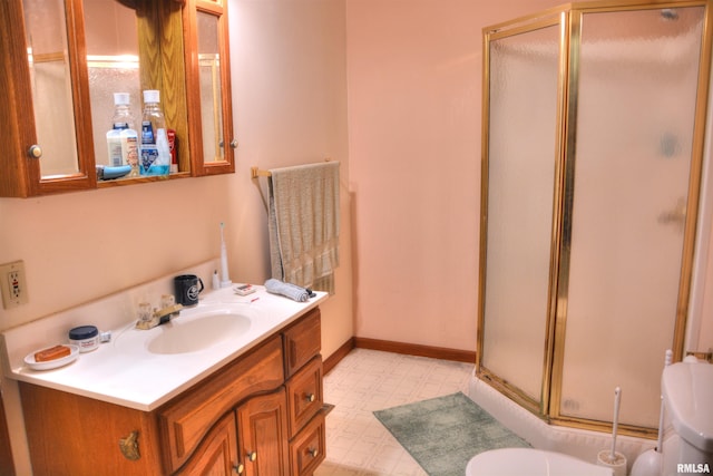 bathroom with vanity and walk in shower