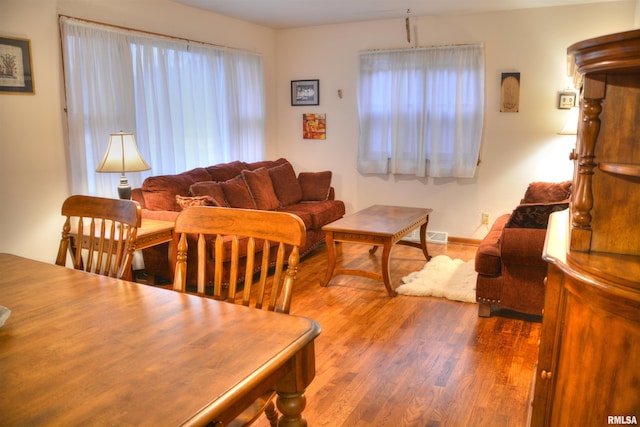 dining space featuring hardwood / wood-style floors