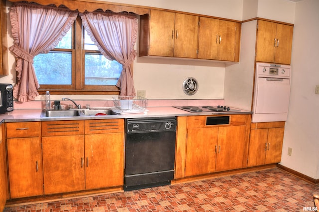 kitchen with sink and black appliances