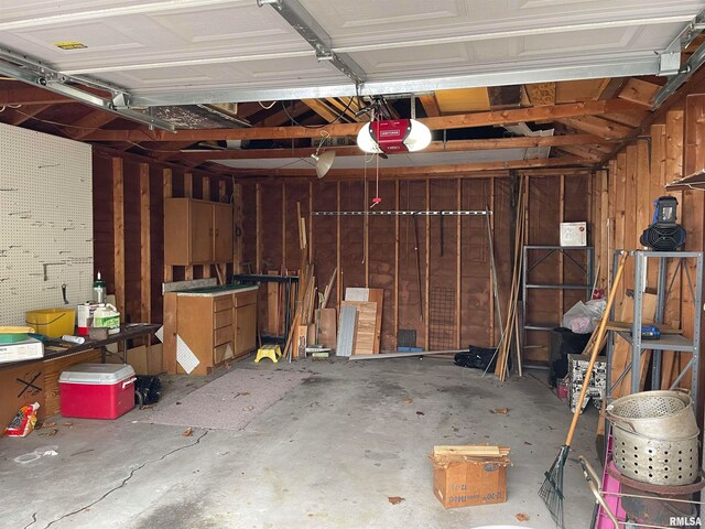 garage featuring a garage door opener