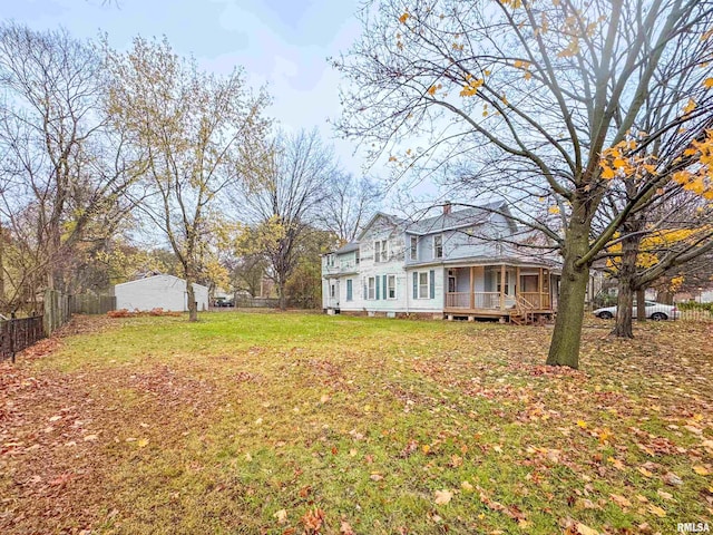 view of yard with a wooden deck