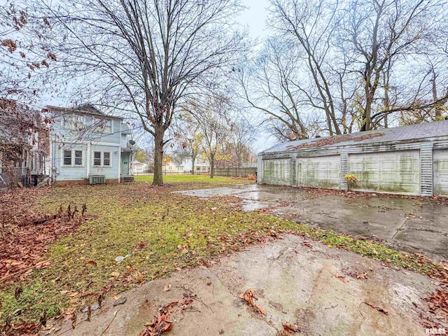 view of yard with central AC