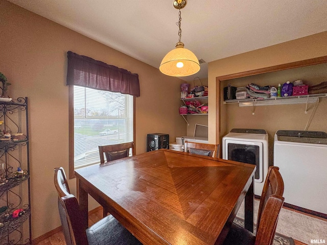 dining area with independent washer and dryer