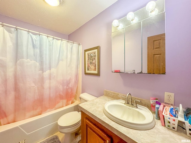 full bathroom featuring a textured ceiling, vanity, shower / bath combo, and toilet